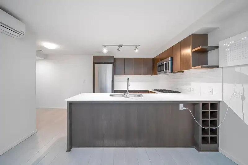 701 7888 ACKROYD ROAD - photo 2 of 32