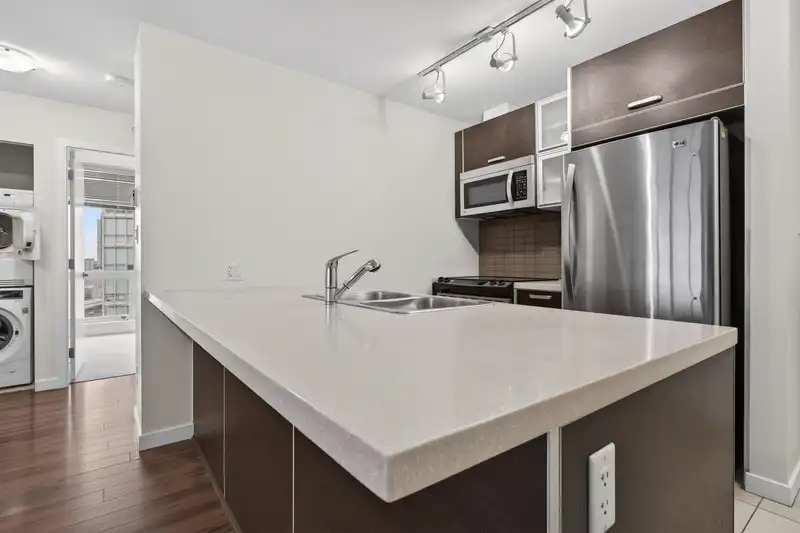 3109 9981 WHALLEY BOULEVARD - photo 1 of 16
