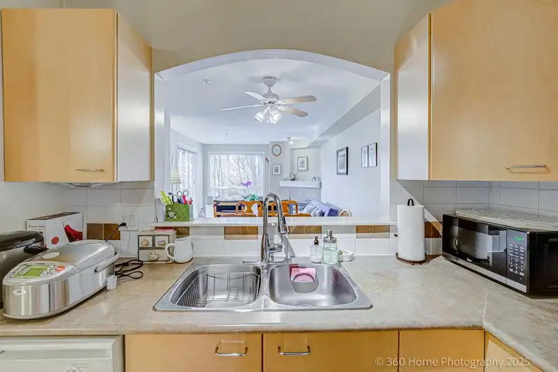 307 8495 JELLICOE STREET - photo 1 of 22