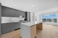 1306 5520 MCNAUGHTON ROAD - thumbnail 1