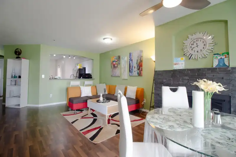 306 20120 56 AVENUE - photo 1 of 13