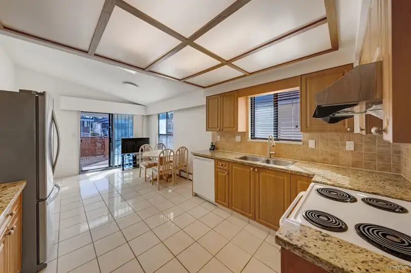 3056 E 28TH AVENUE - photo 2 of 36