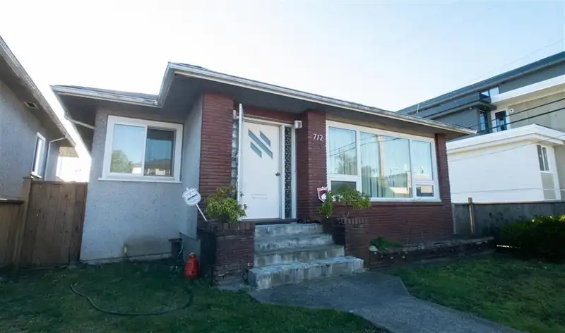 712 E 57 AVENUE - photo 1 of 7