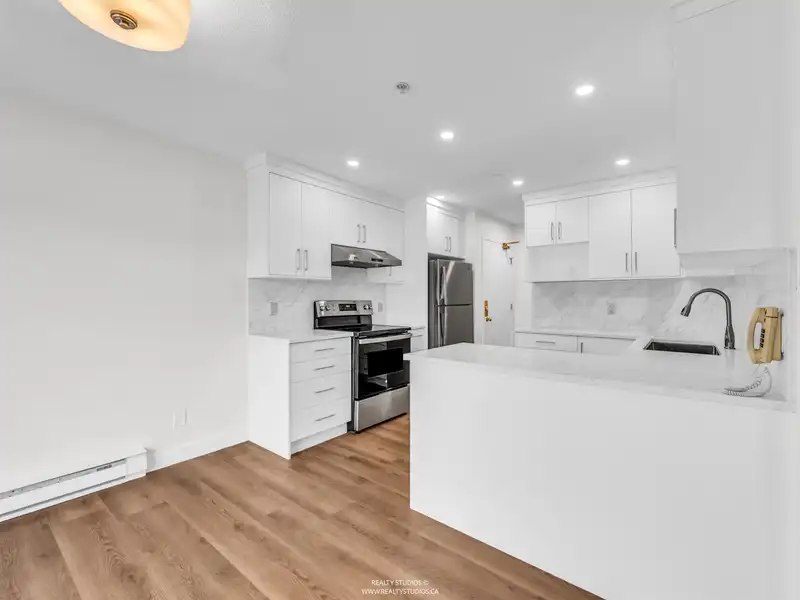 402 12130 80 AVENUE - photo 3 of 31