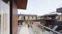 206 4385 WILLOW STREET - thumbnail 1