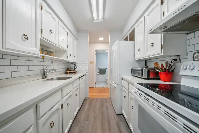 202 8770 LAUREL STREET - photo 1 of 20