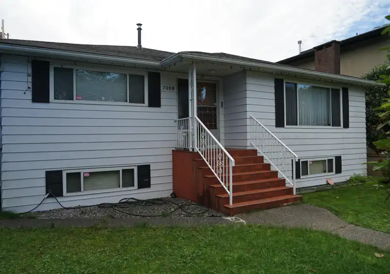 7008 CURTIS STREET - photo 1 of 9