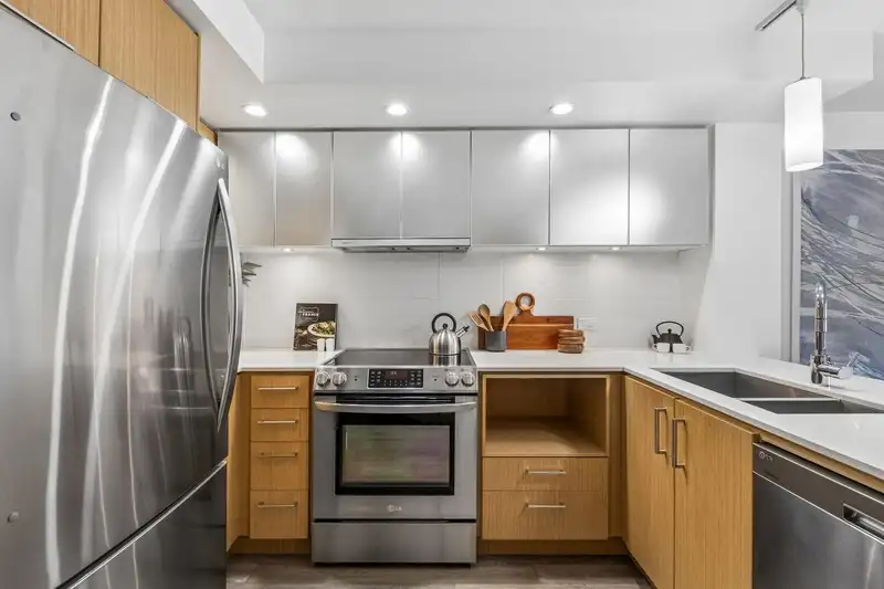 211 221 E 3RD STREET - photo 2 of 31