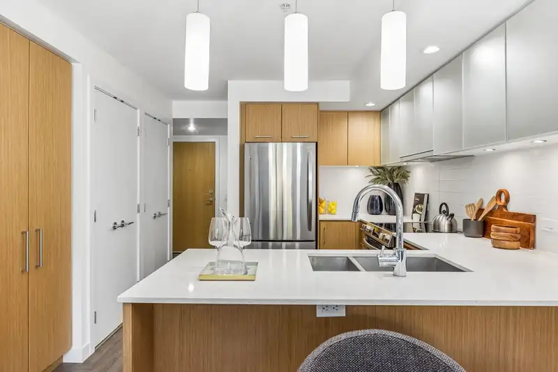 211 221 E 3RD STREET - photo 3 of 31