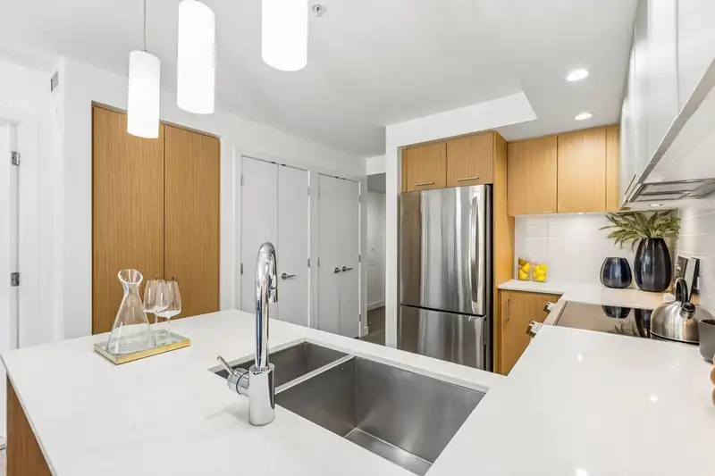 211 221 E 3RD STREET - photo 4 of 31