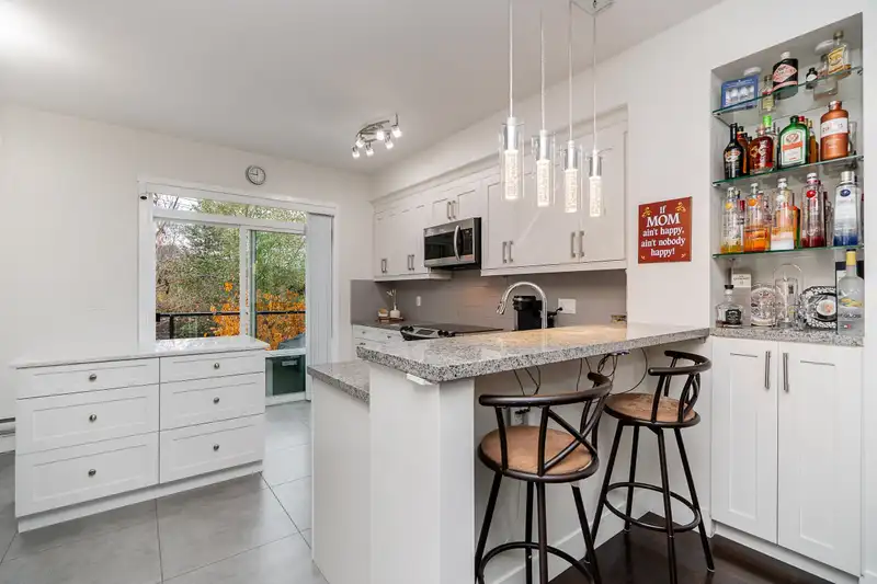 21 1299 COAST MERIDIAN ROAD - photo 4 of 40