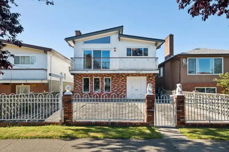 2047 E 52ND AVENUE - photo 1 of 38