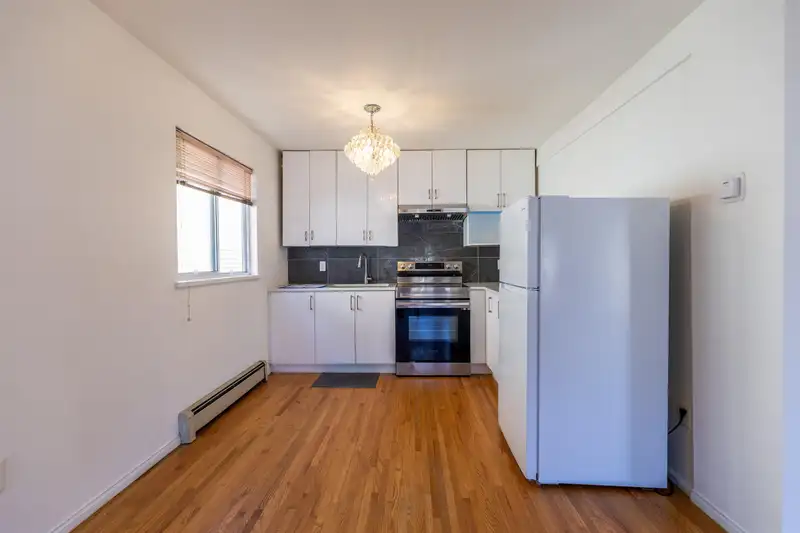 1266 E 63RD AVENUE - photo 3 of 34