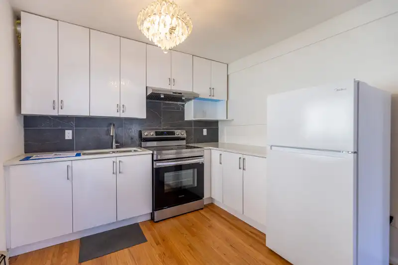 1266 E 63RD AVENUE - photo 4 of 34