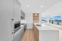 609 5520 MCNAUGHTON ROAD - thumbnail 2
