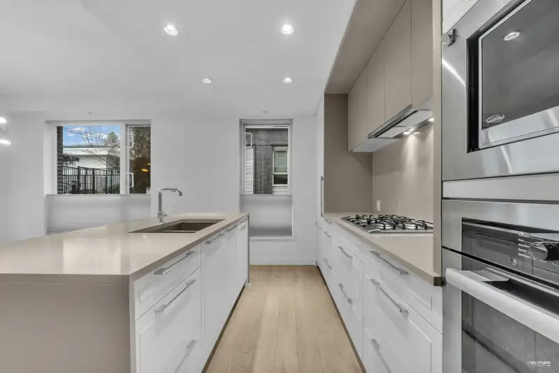 109 6677 CAMBIE STREET - photo 1 of 29