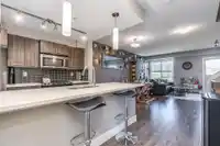 208 2110 ROWLAND STREET - thumbnail 2