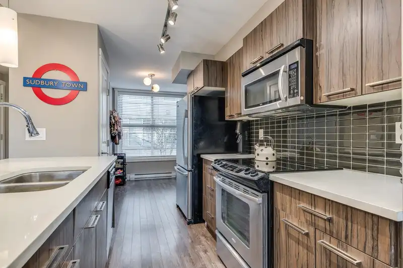 208 2110 ROWLAND STREET - photo 3 of 40