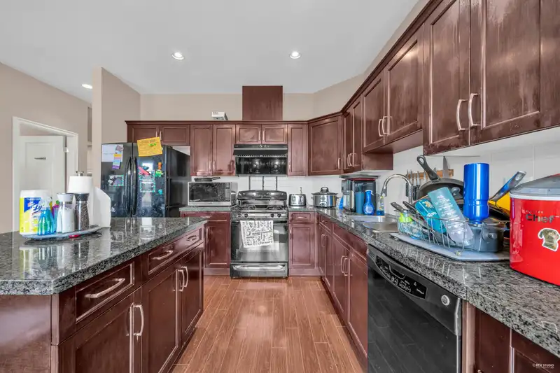 6942 208 STREET - photo 3 of 33