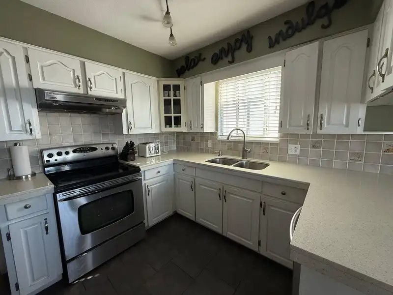 1288 E 59TH AVENUE - photo 4 of 28