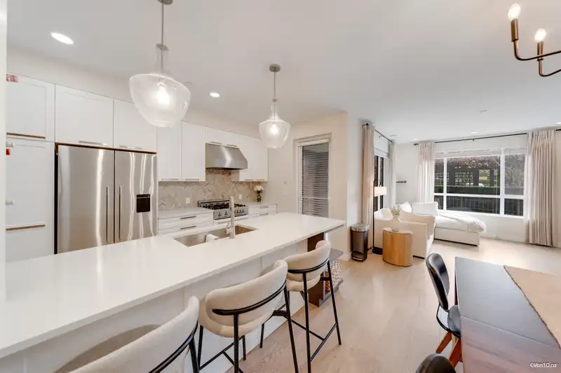 102 33540 MAYFAIR AVENUE - photo 1 of 35