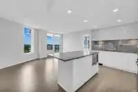 1107 3699 SEXSMITH ROAD - thumbnail 4