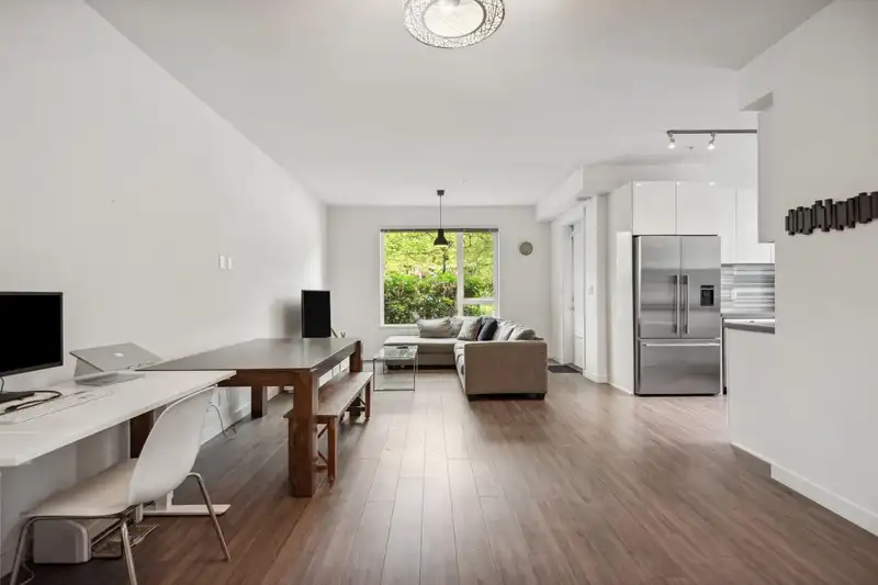 107 3138 RIVERWALK AVENUE - photo 1 of 18