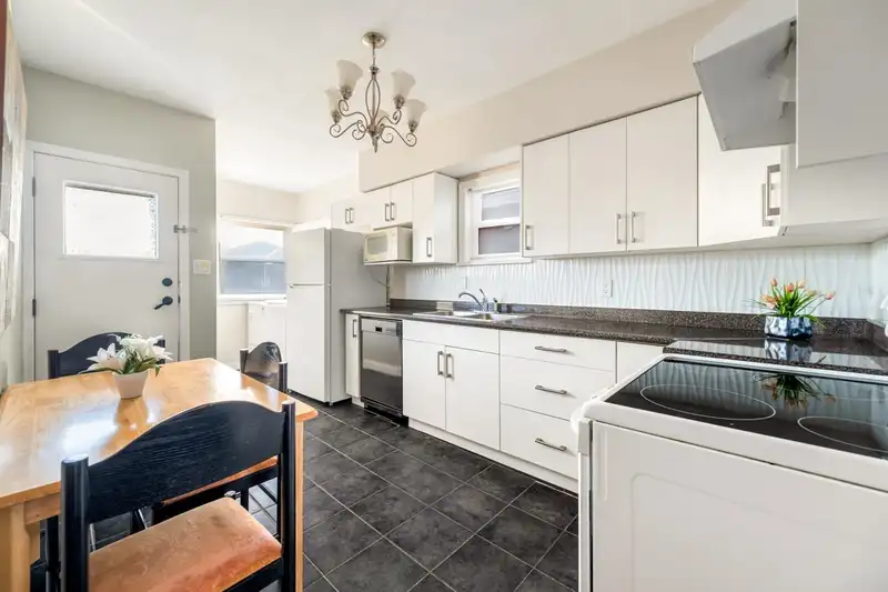 1032 E 49TH AVENUE - photo 3 of 17