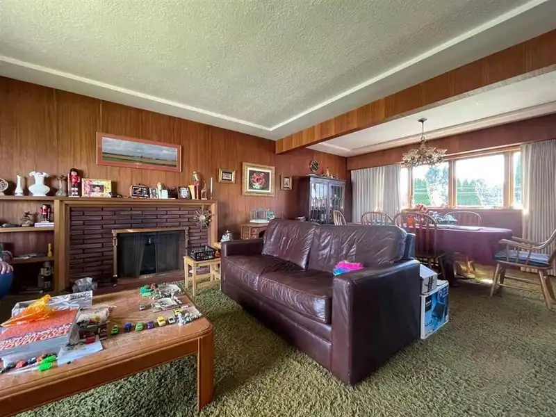 7833 COQUITLAM STREET - photo 3 of 14