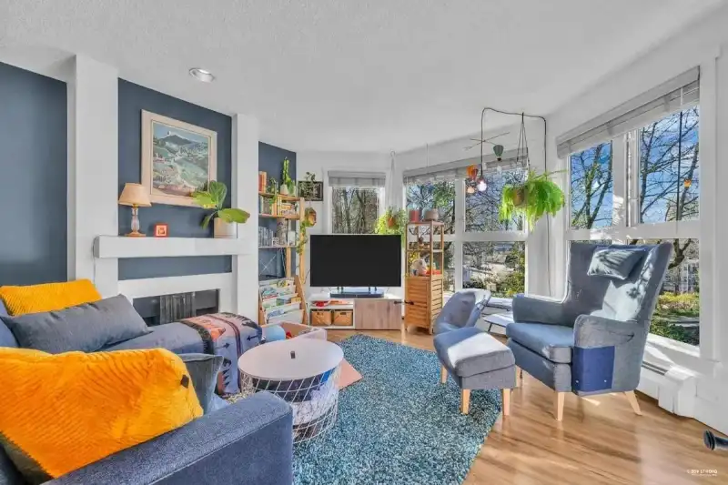 210 7055 WILMA STREET - photo 1 of 32
