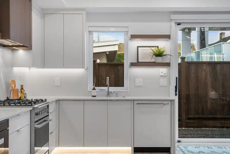 1135 W 33RD AVENUE - photo 3 of 39